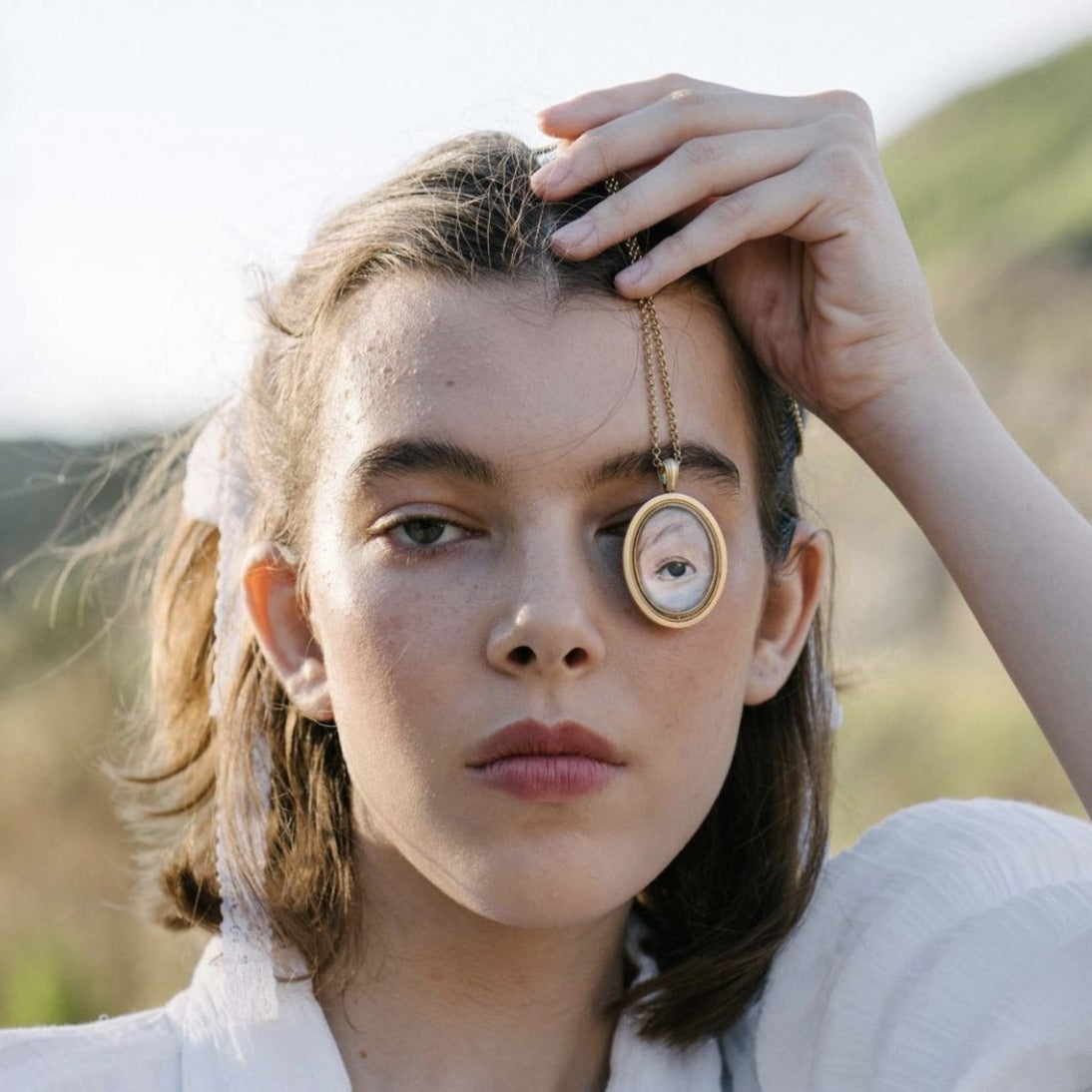 CUSTOM LOVERS EYE PENDANT